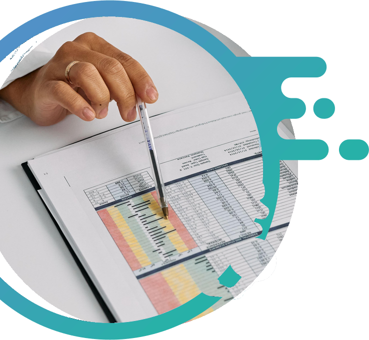 Hand reviewing medical documentation with a pen
